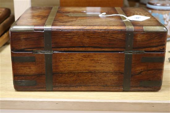 An early Victorian brass mounted rosewood toilet box with fitted plate, mounted interior width 30cm depth 21cm